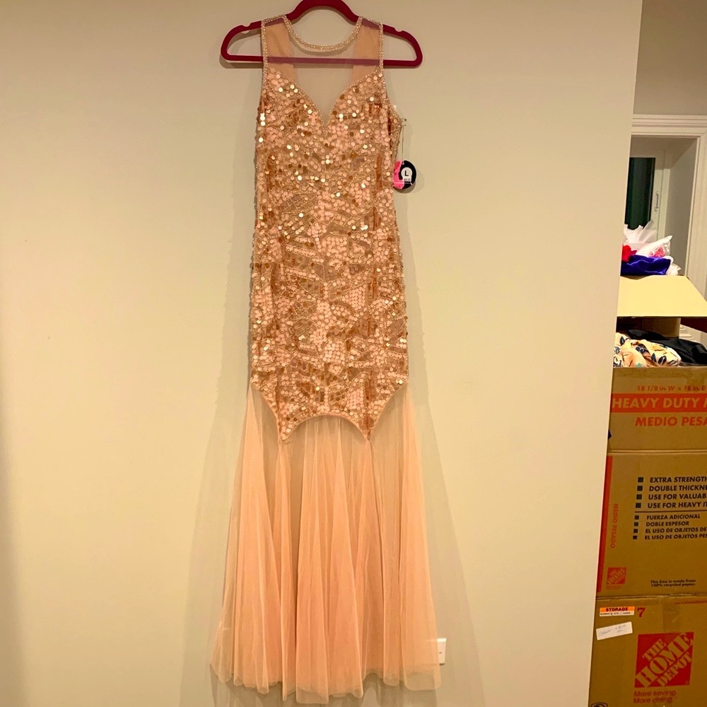Glamorous brand new dress. Last few left!